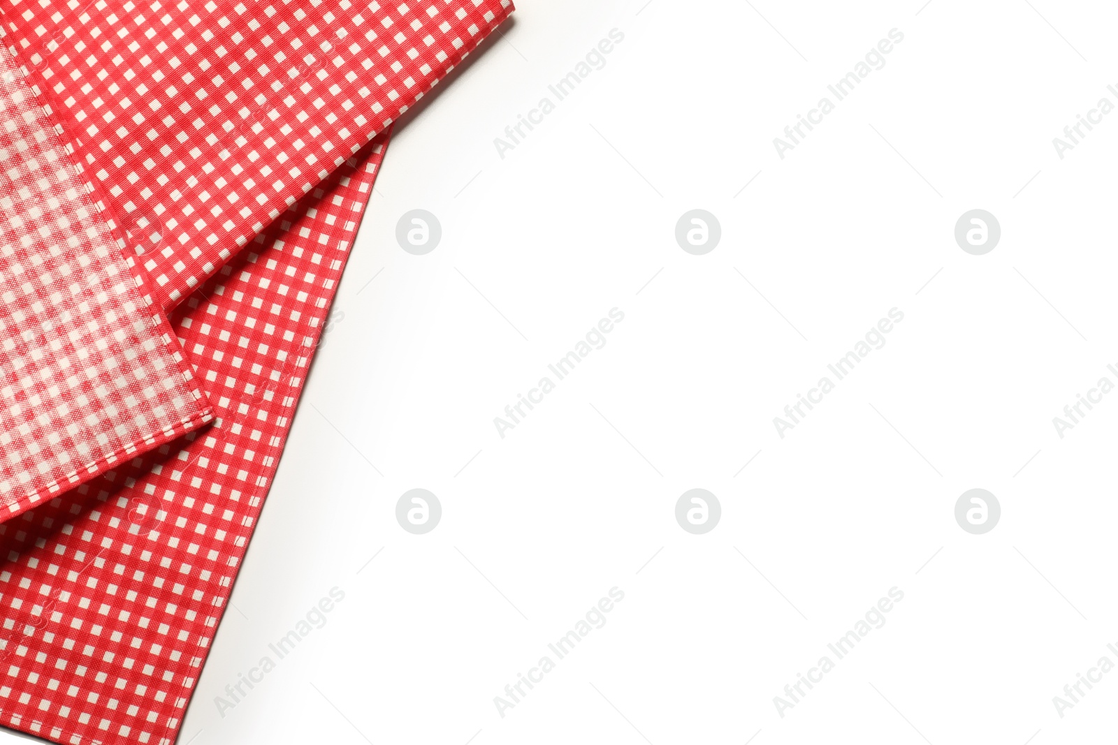 Photo of Red checkered tablecloth isolated on white, top view