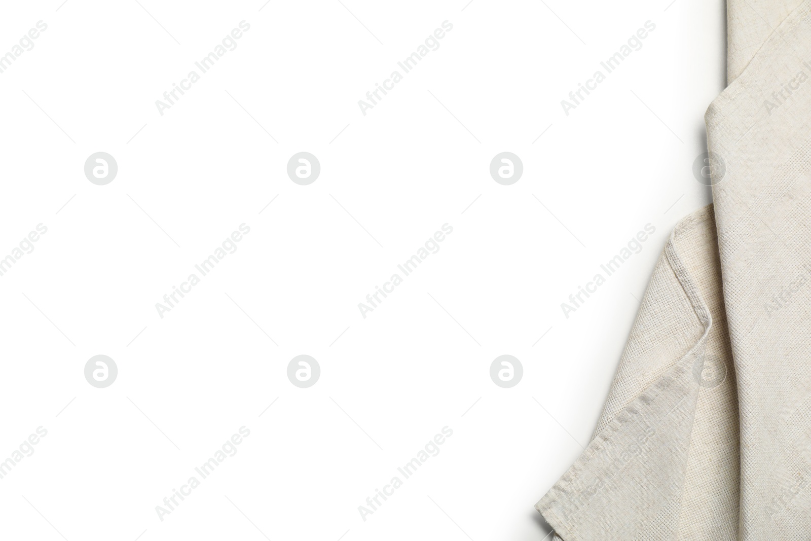 Photo of Light tablecloth isolated on white, top view