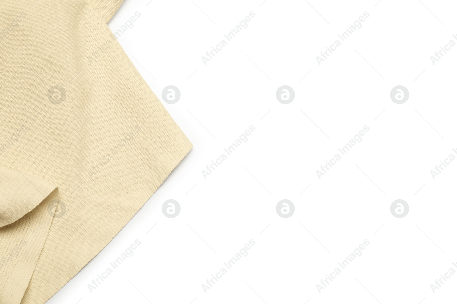 Photo of Beige tablecloth isolated on white, top view