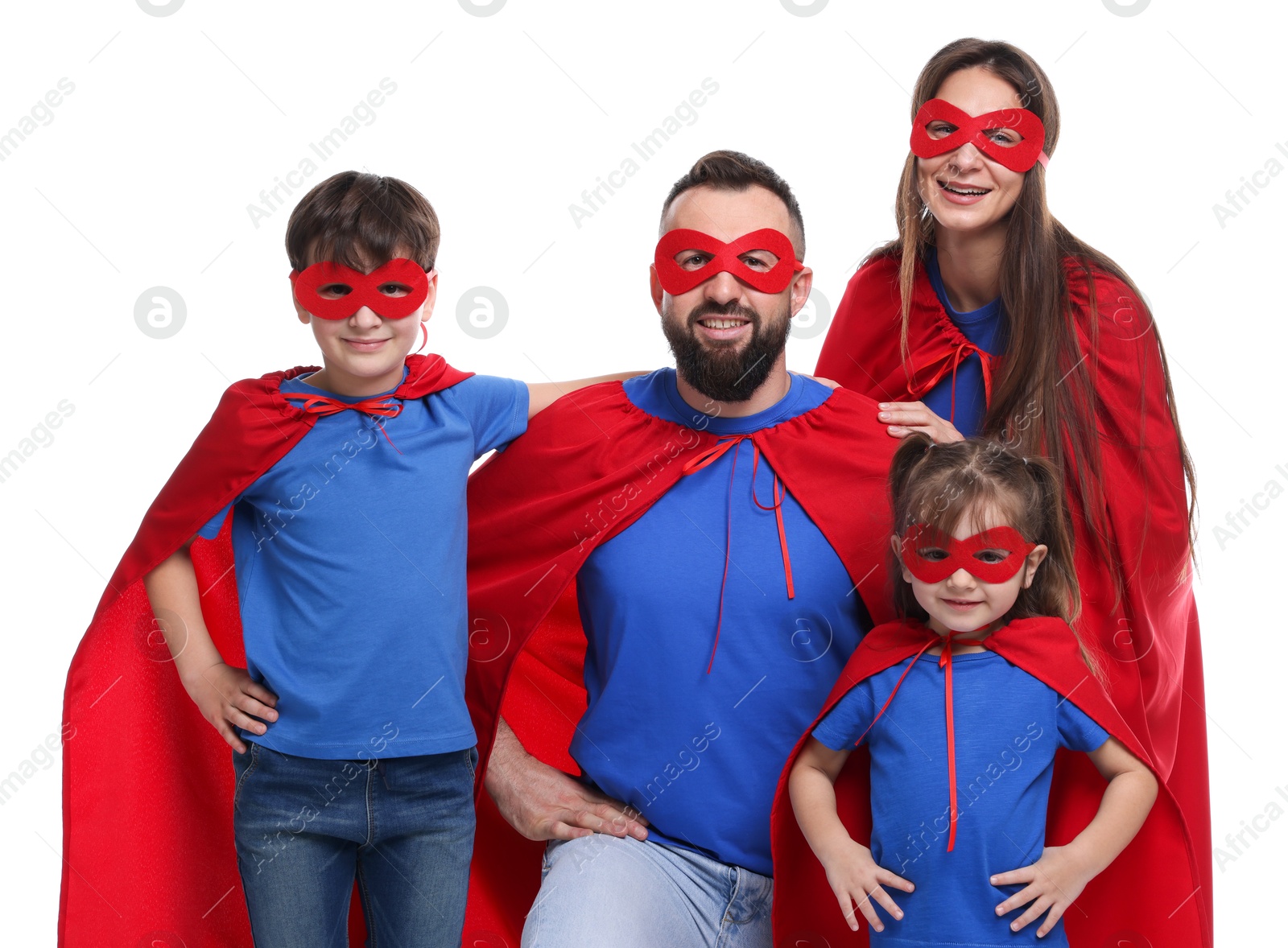 Photo of Parents and their children wearing superhero costumes on white background