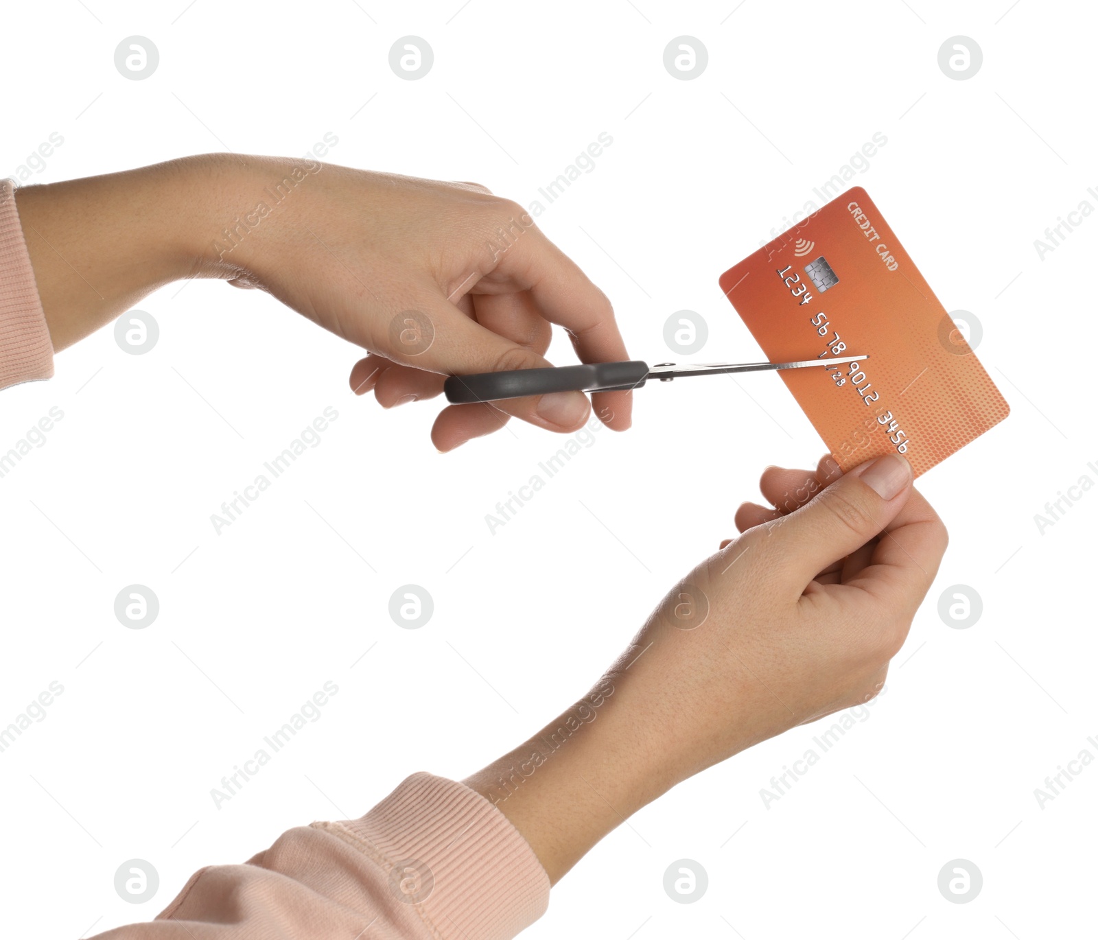 Photo of Woman cutting credit card on white background, closeup