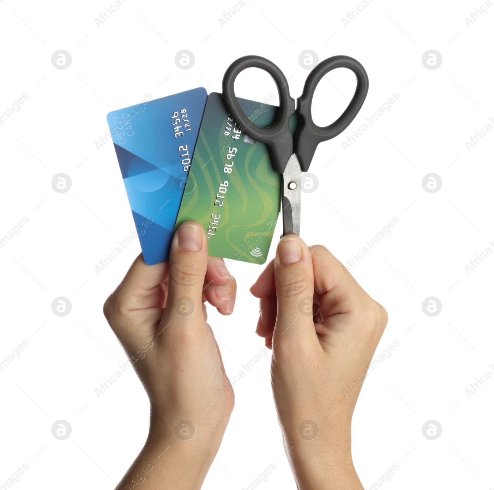 Photo of Woman with credit cards and scissors on white background, closeup