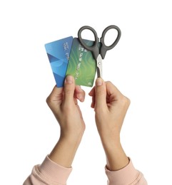 Photo of Woman with credit cards and scissors on white background, closeup