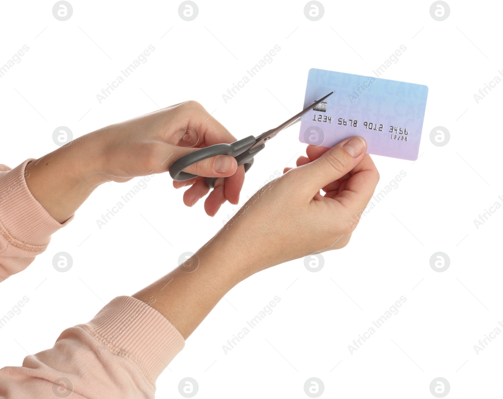 Photo of Woman cutting credit card on white background, closeup