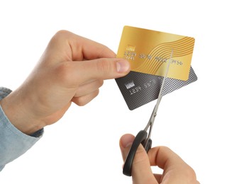 Photo of Woman cutting credit cards on white background, closeup