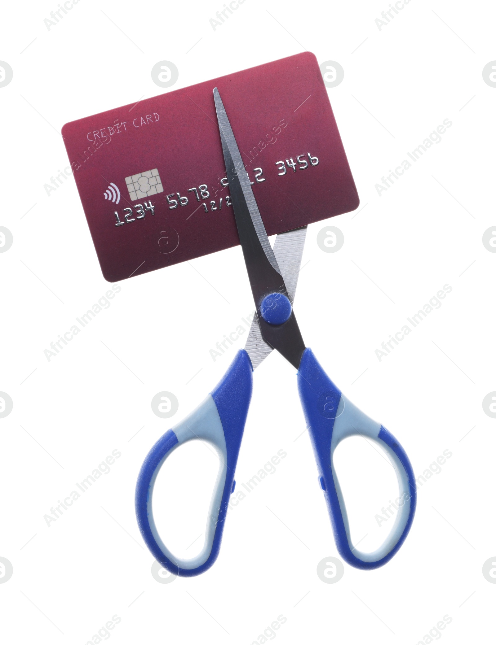 Photo of Credit card and scissors isolated on white