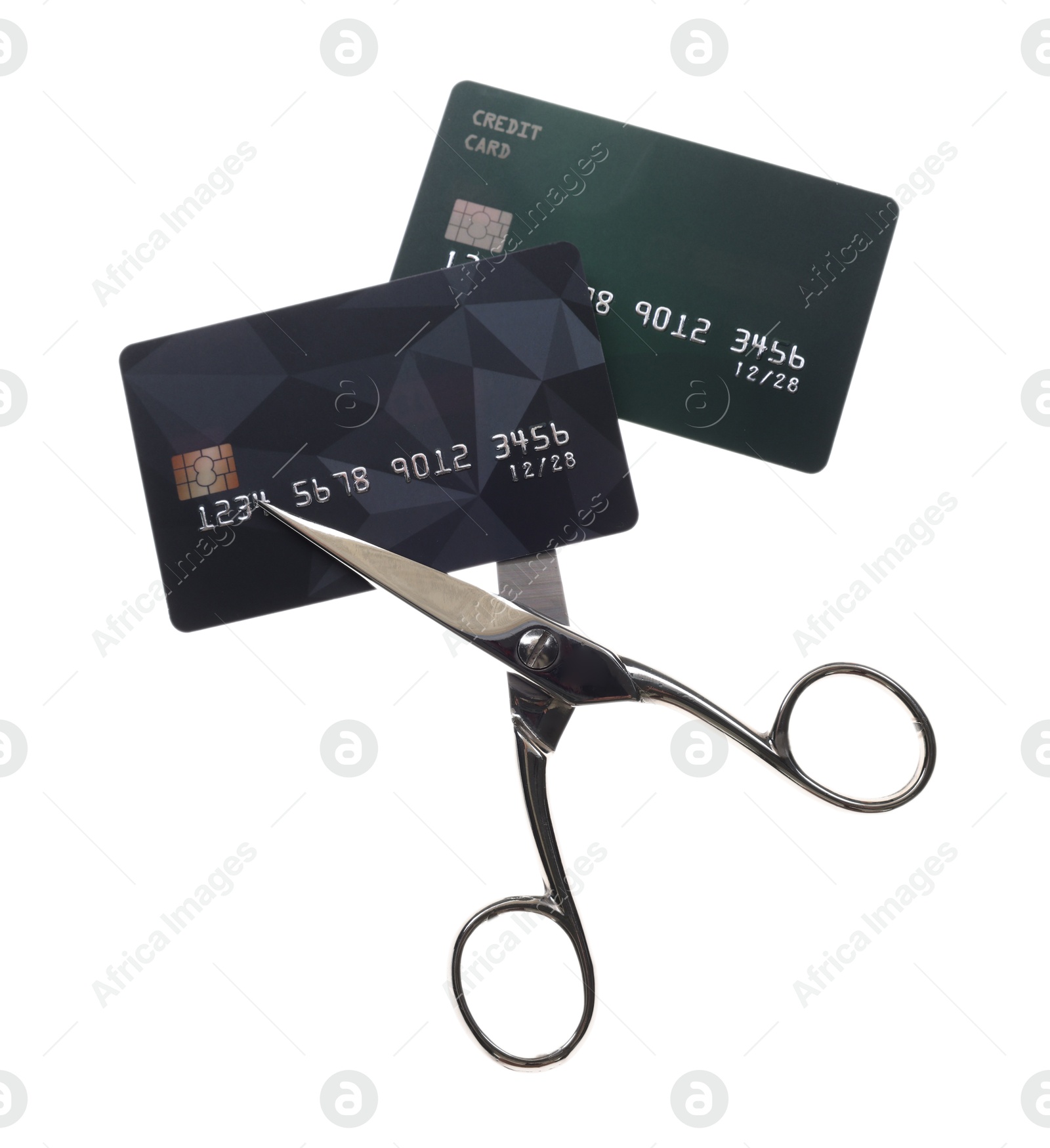 Photo of Credit cards and scissors isolated on white