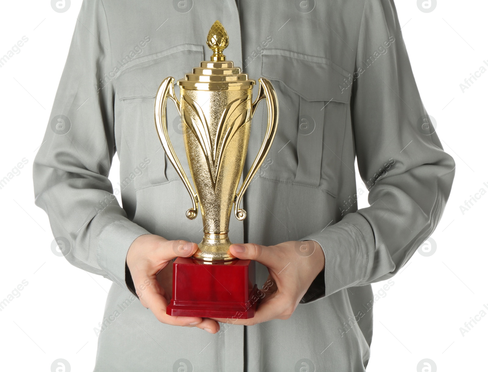 Photo of Woman with golden trophy cup on white background, closeup