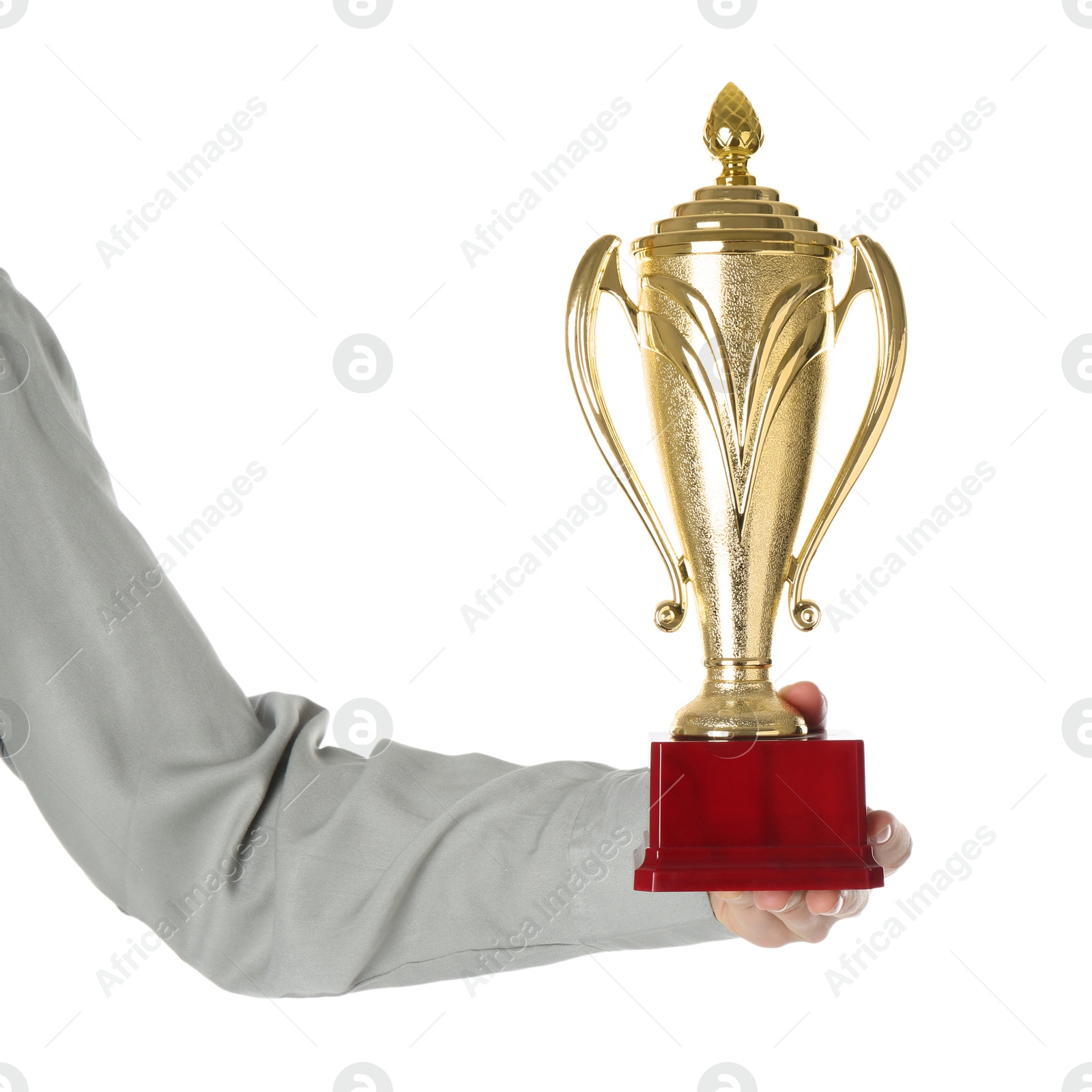 Photo of Woman with golden trophy cup on white background, closeup