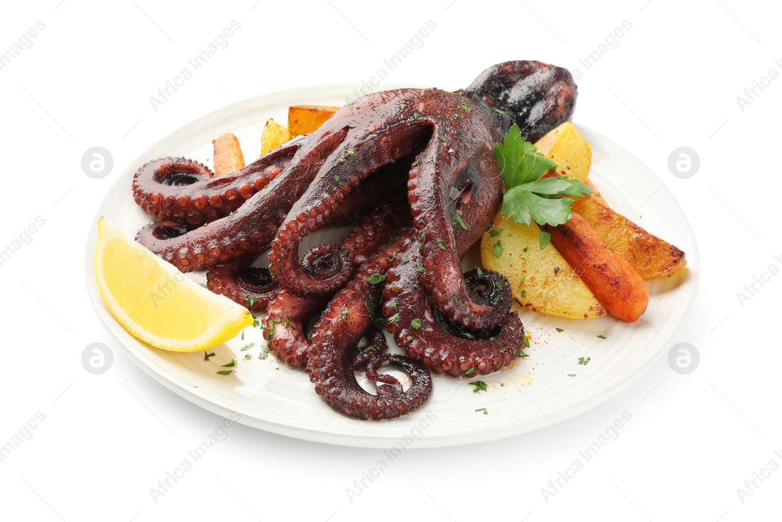 Photo of Roasted octopus with vegetables and lemon isolated on white