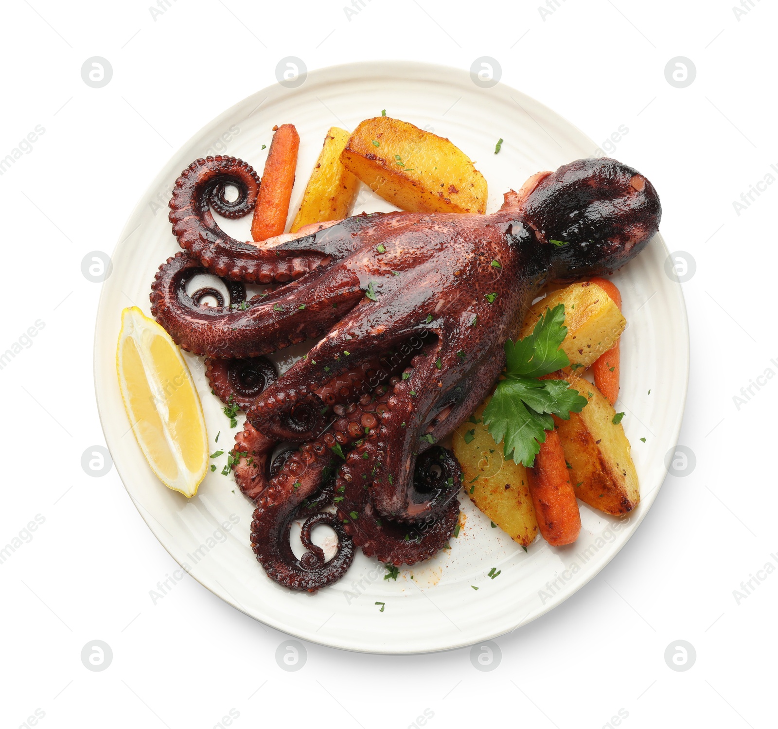 Photo of Roasted octopus with vegetables and lemon isolated on white, top view