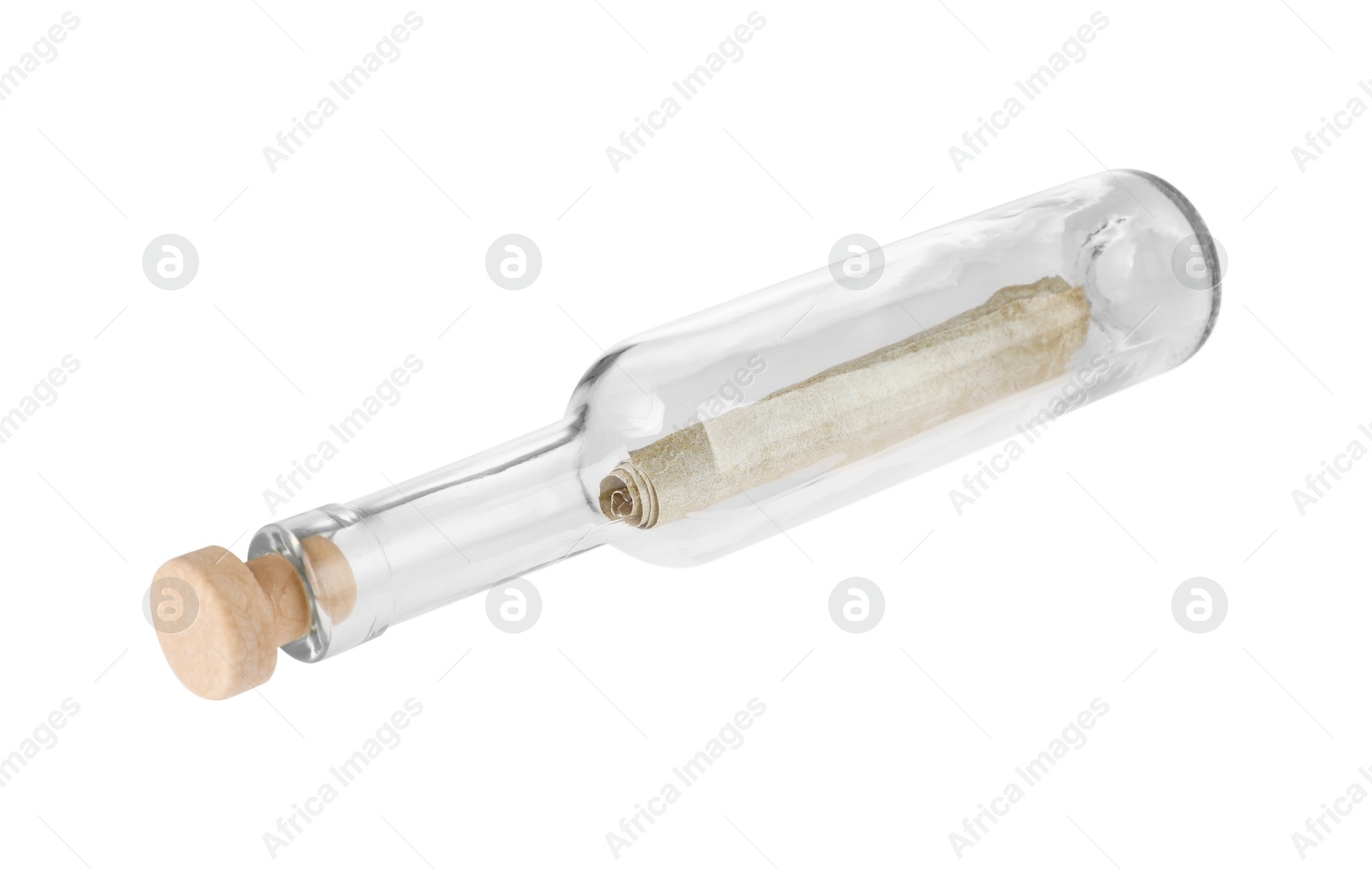 Photo of Corked glass bottle with rolled letter isolated on white