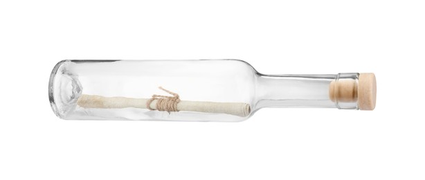 Photo of Corked glass bottle with rolled letter isolated on white