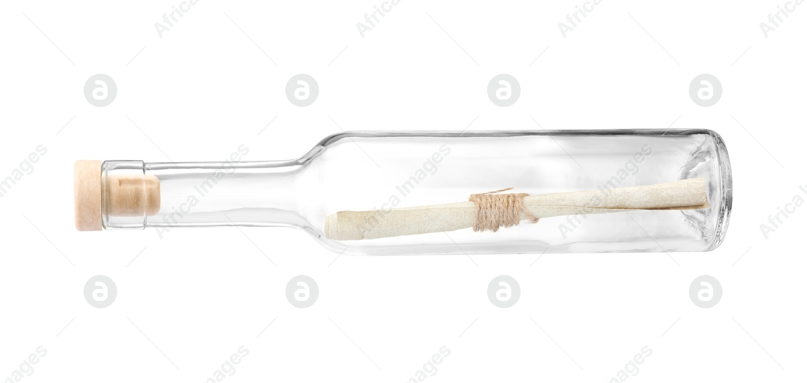 Photo of Corked glass bottle with rolled letter isolated on white