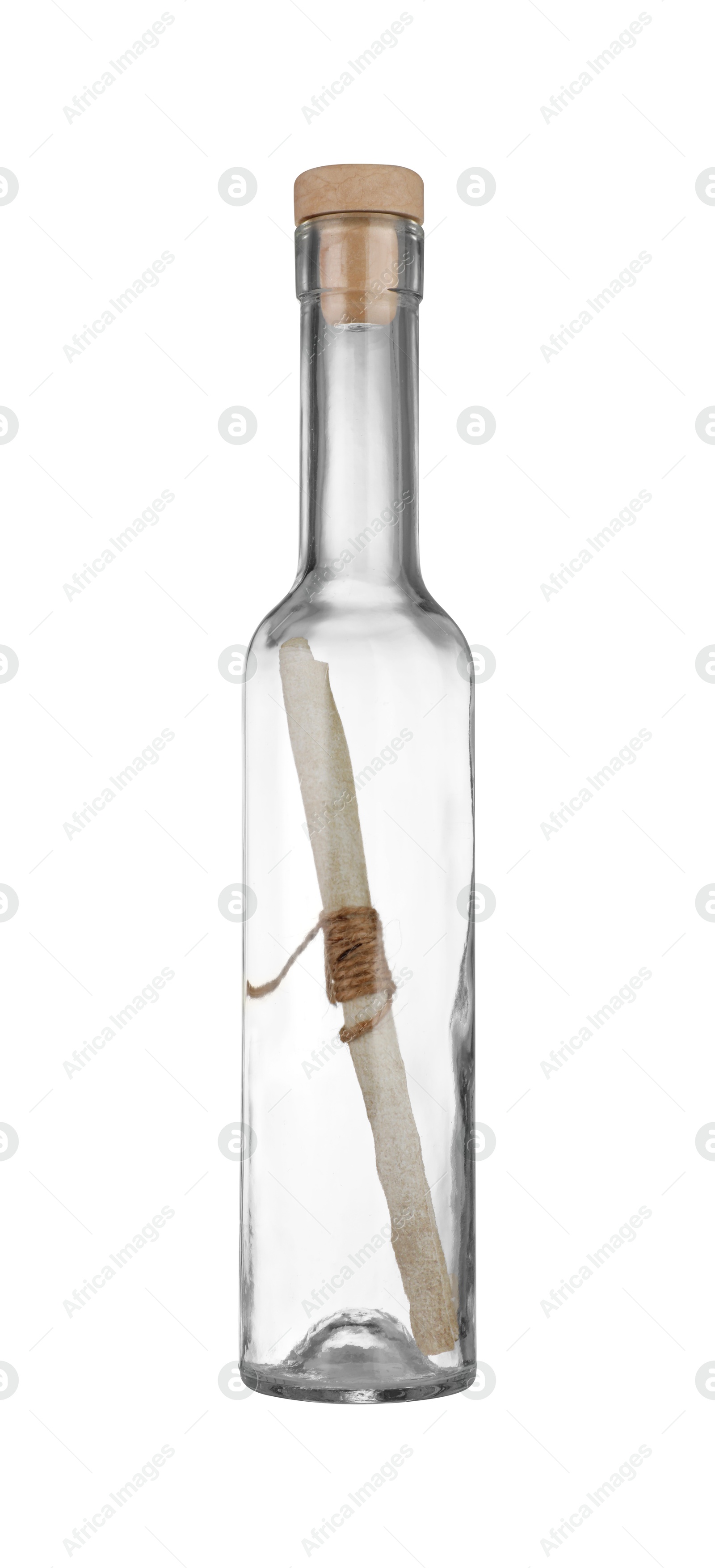 Photo of Corked glass bottle with rolled letter isolated on white