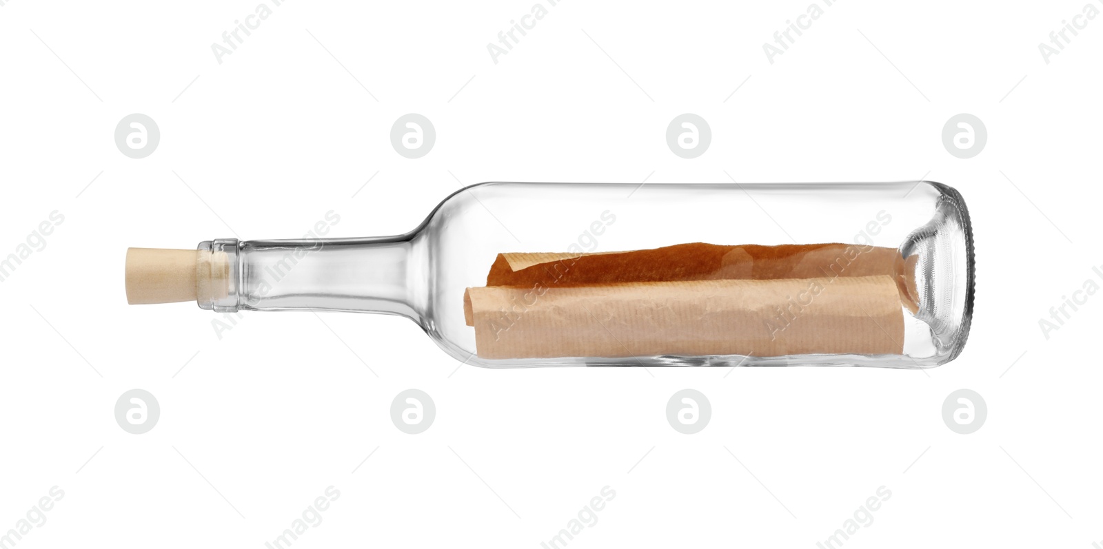 Photo of Corked glass bottle with rolled letter isolated on white