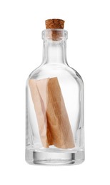 Photo of Corked glass bottle with rolled letter isolated on white