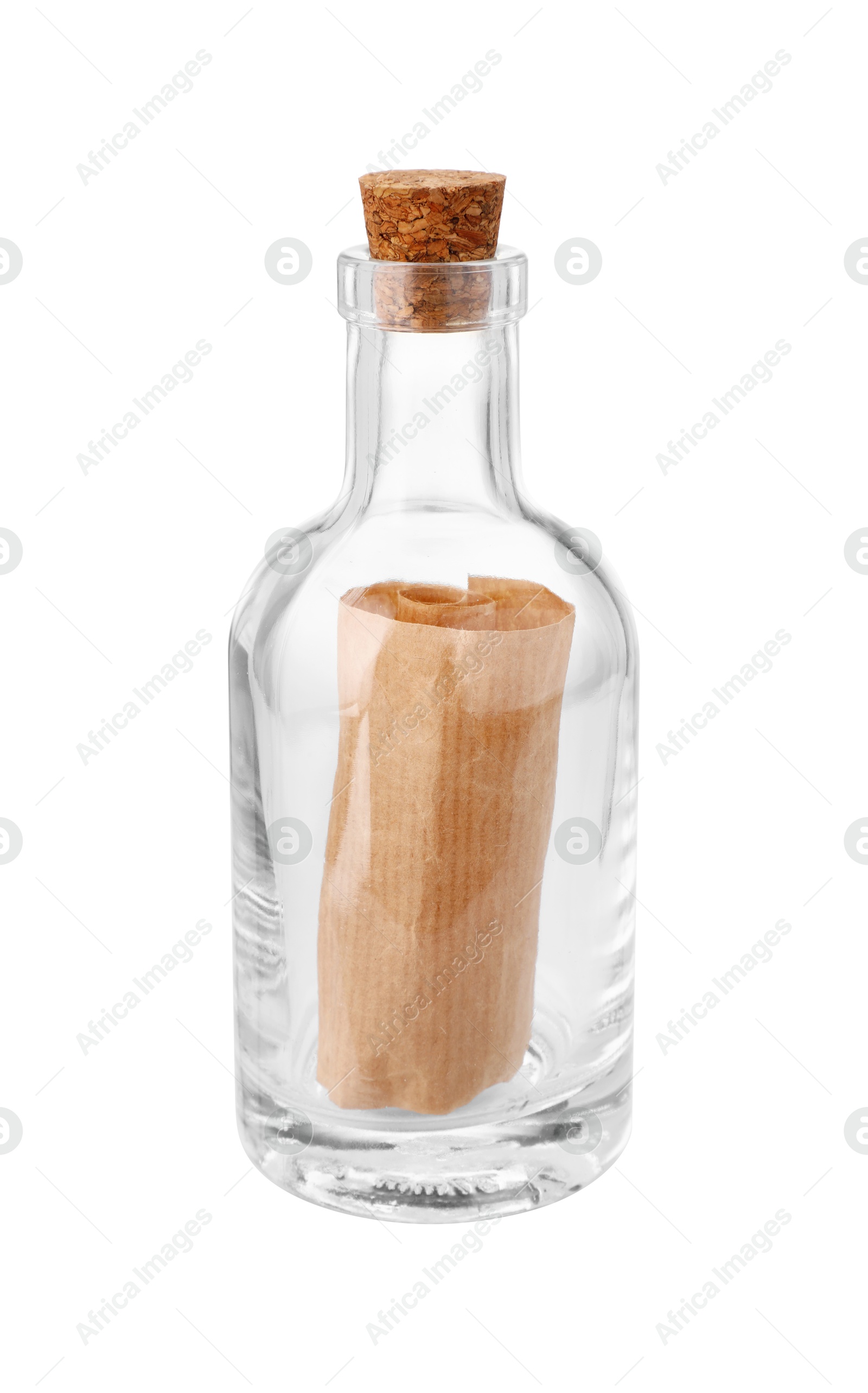 Photo of Corked glass bottle with rolled letter isolated on white