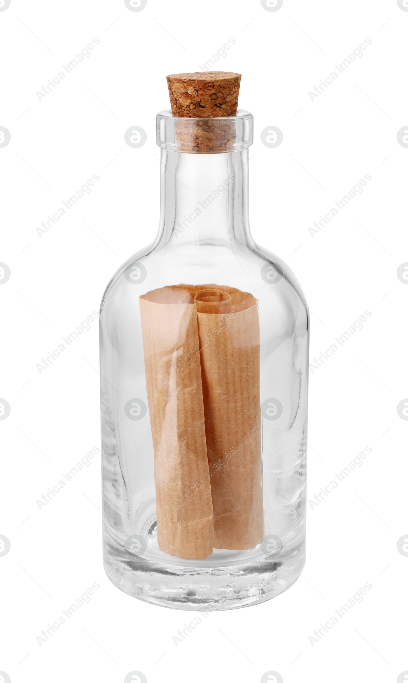 Photo of Corked glass bottle with rolled letter isolated on white