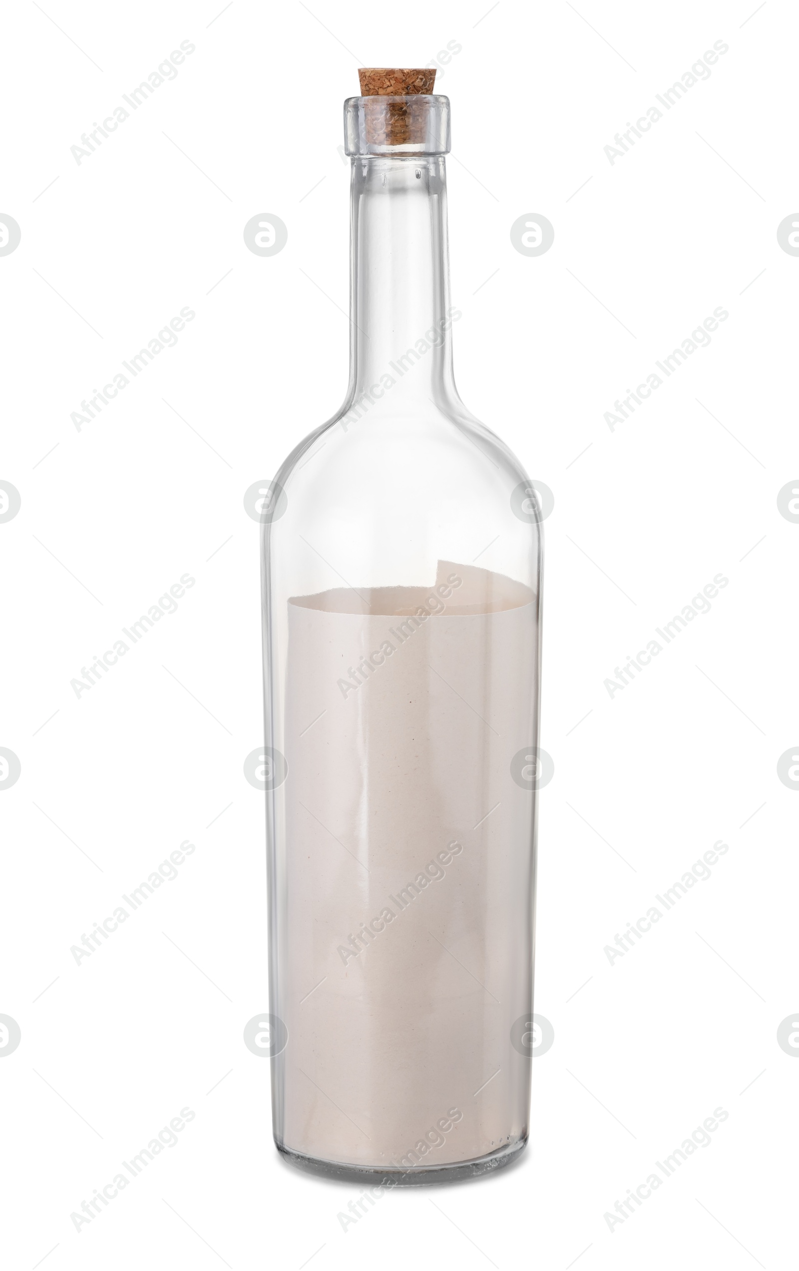 Photo of Rolled letter in corked glass bottle isolated on white