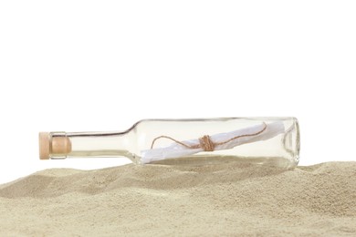 Photo of Rolled letter in corked glass bottle on sand against white background