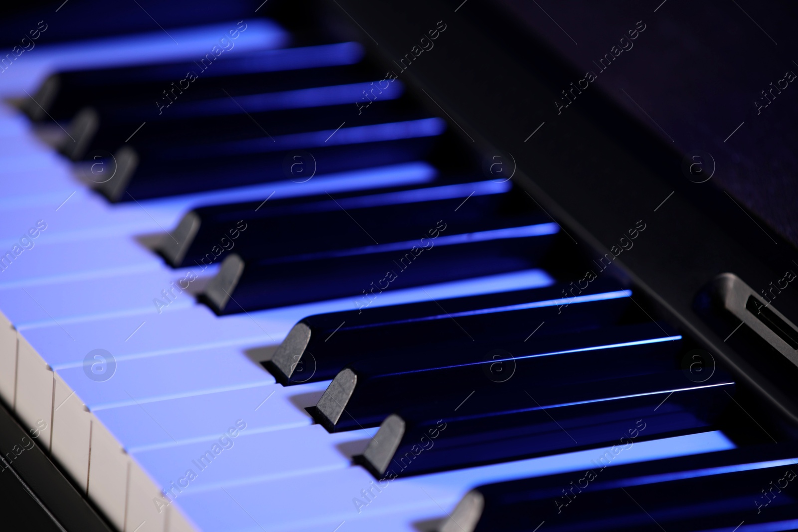 Photo of Beautiful piano as background, closeup view. Festive music