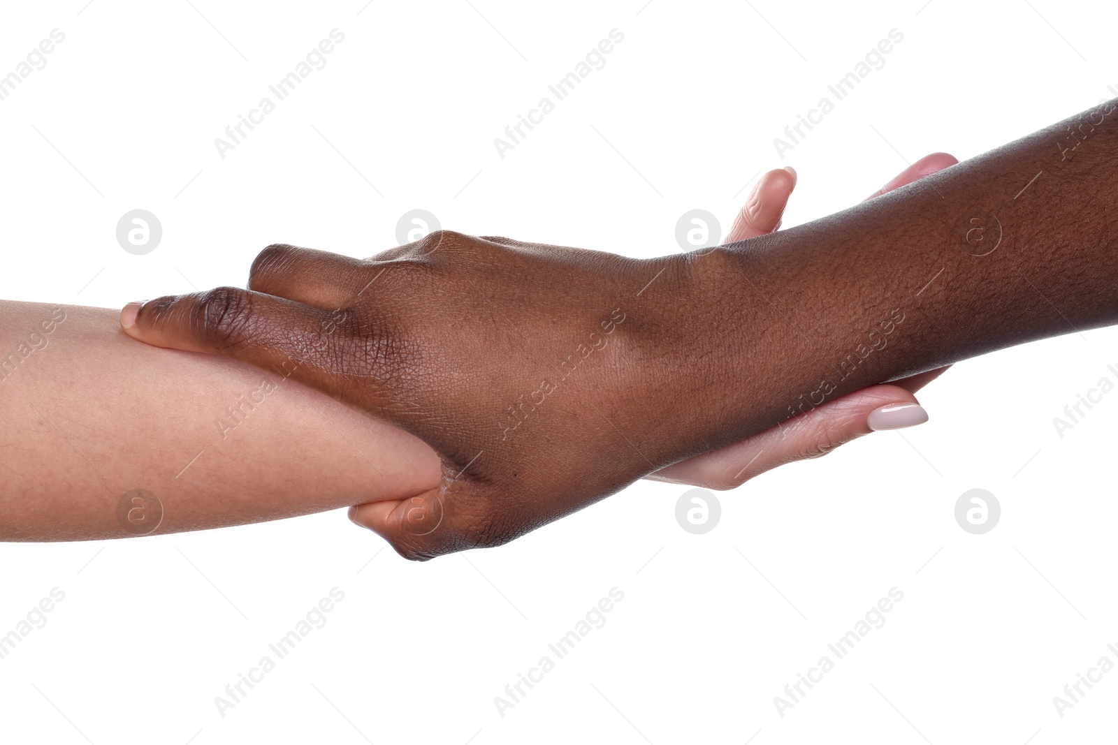 Photo of Stop racism. People of different skin colors holding hands on white background, closeup