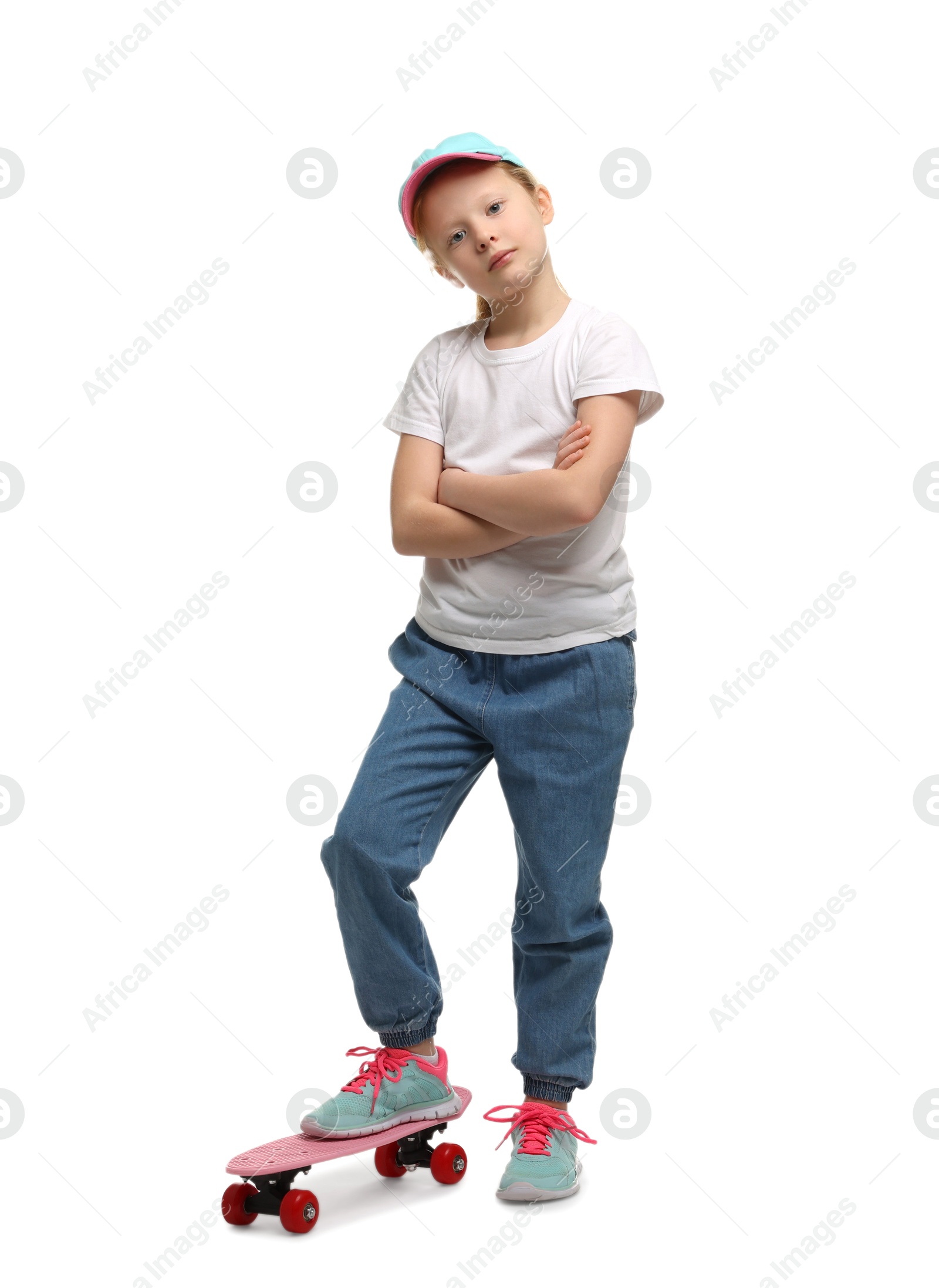 Photo of Little girl with penny board on white background