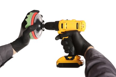 Photo of Man holding electric screwdriver with polish pad on white background, closeup