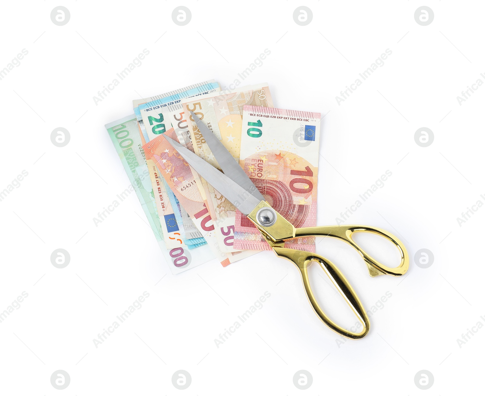 Photo of Euro banknotes and scissors isolated on white, top view