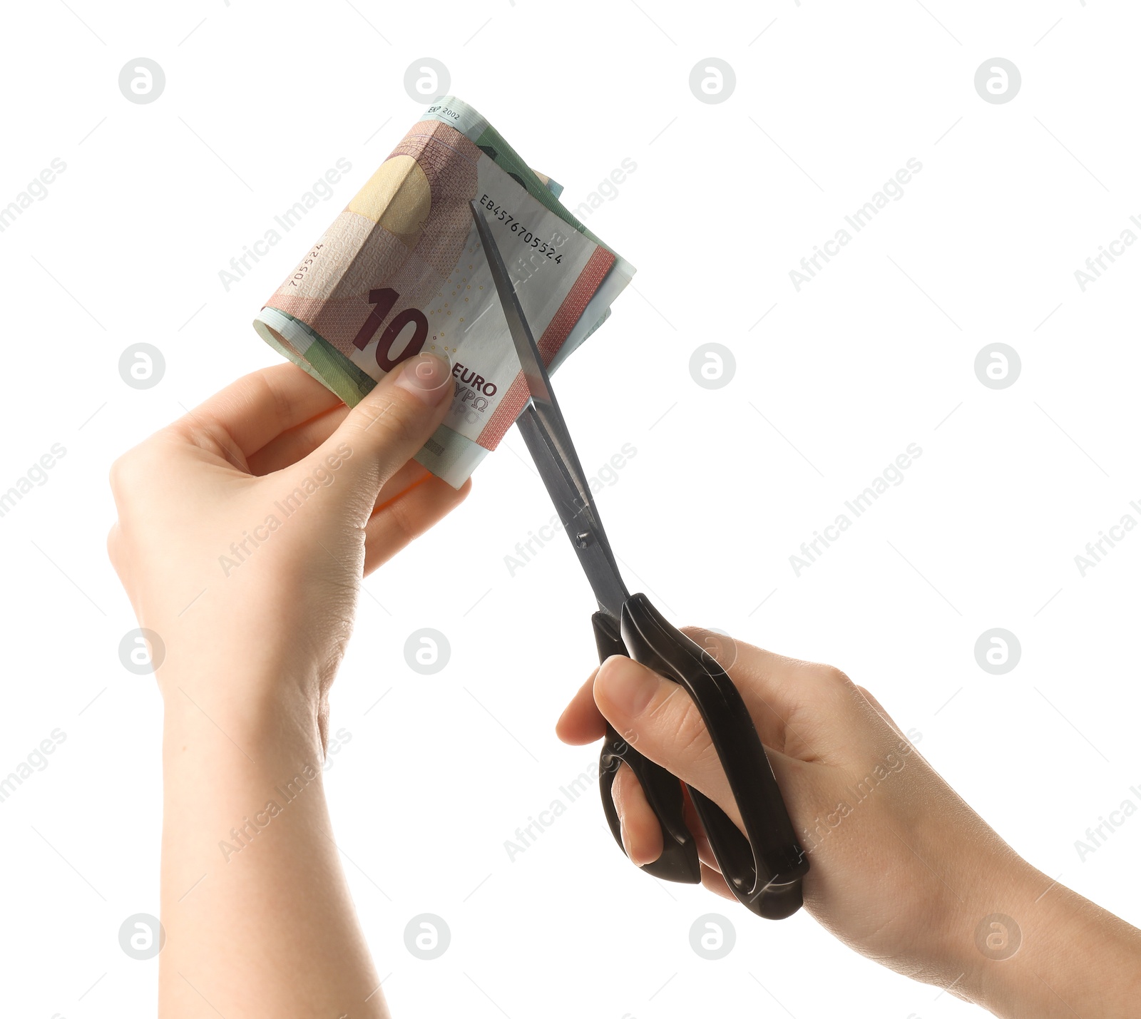 Photo of Woman cutting euro banknotes on white background, closeup