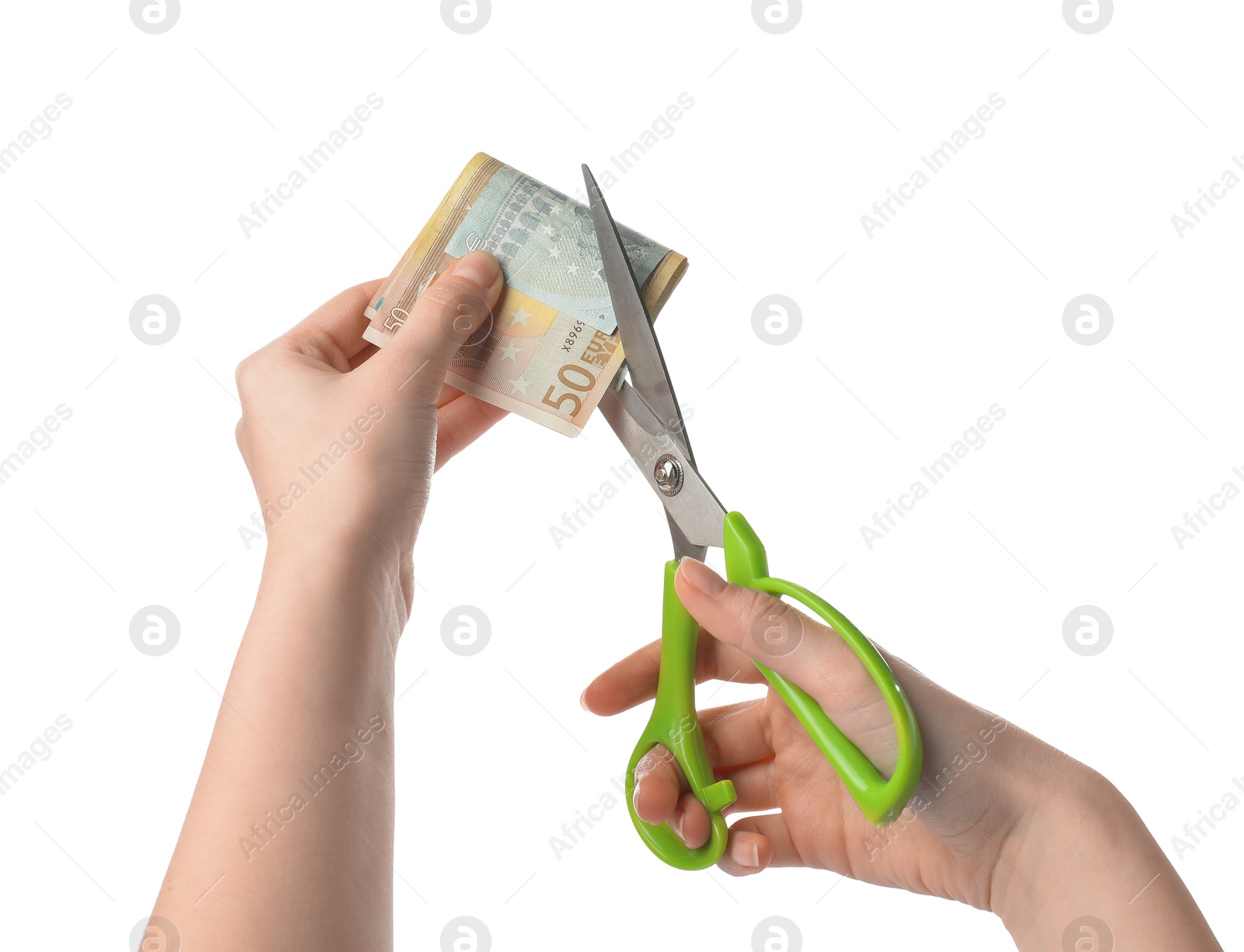 Photo of Woman cutting euro banknotes on white background, closeup