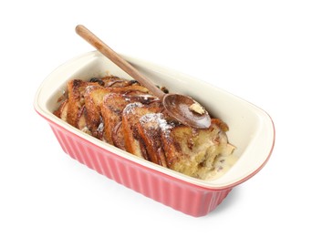 Photo of Freshly baked bread pudding in baking dish and spoon isolated on white