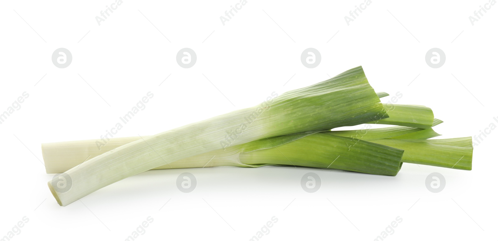 Photo of Fresh leeks isolated on white. Spicy vegetable