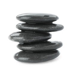 Photo of Stack of wet spa stones isolated on white