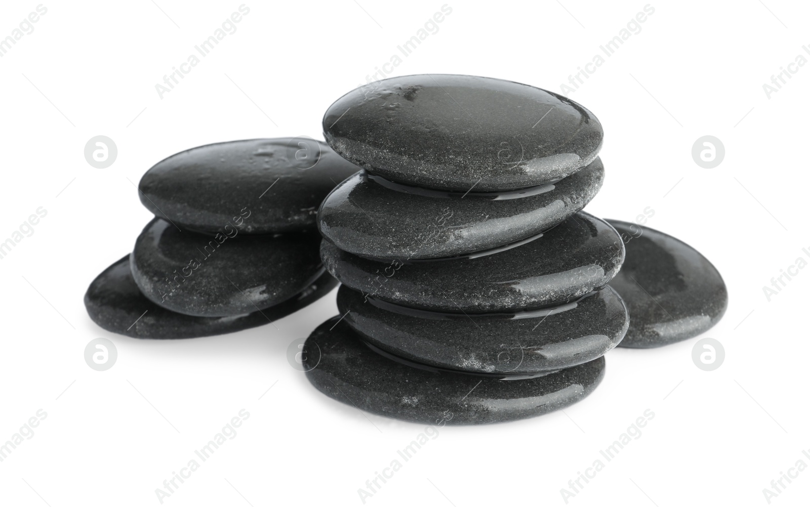 Photo of Wet spa stones isolated on white. Zen and harmony