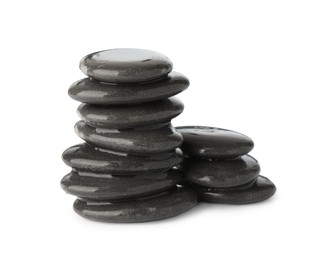 Photo of Stack of wet spa stones isolated on white