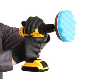 Photo of Man holding electric screwdriver with polish pad on white background, closeup