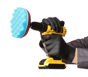 Photo of Man holding electric screwdriver with polish pad on white background, closeup