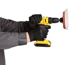 Photo of Man holding electric screwdriver with polish pad on white background, closeup