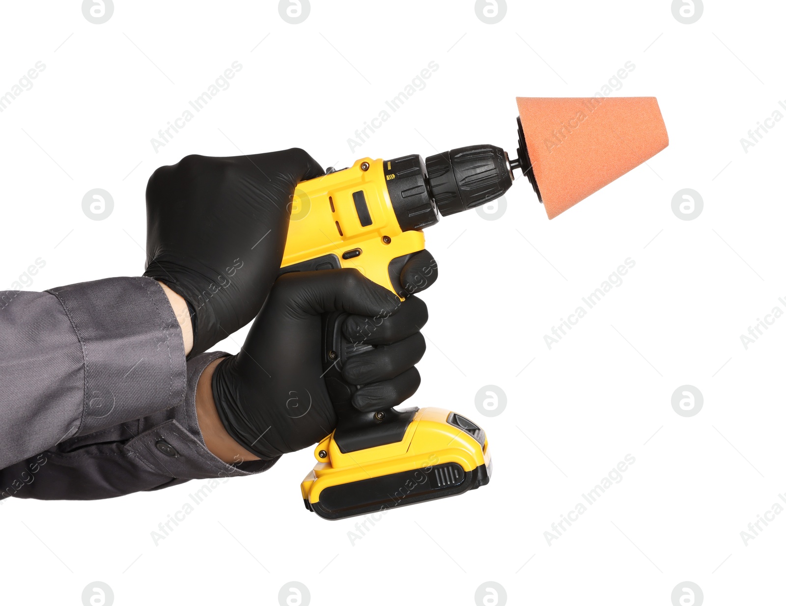 Photo of Man holding electric screwdriver with polish pad on white background, closeup