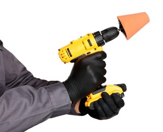 Photo of Man holding electric screwdriver with polish pad on white background, closeup