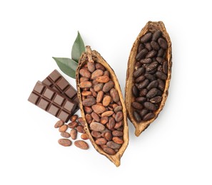 Cocoa pods with beans, chocolate and leaves isolated on white, top view