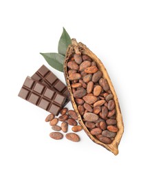 Cocoa pod with beans, chocolate and leaves isolated on white, top view