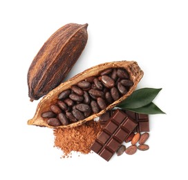 Cocoa pods with beans, powder, chocolate and leaves isolated on white, top view