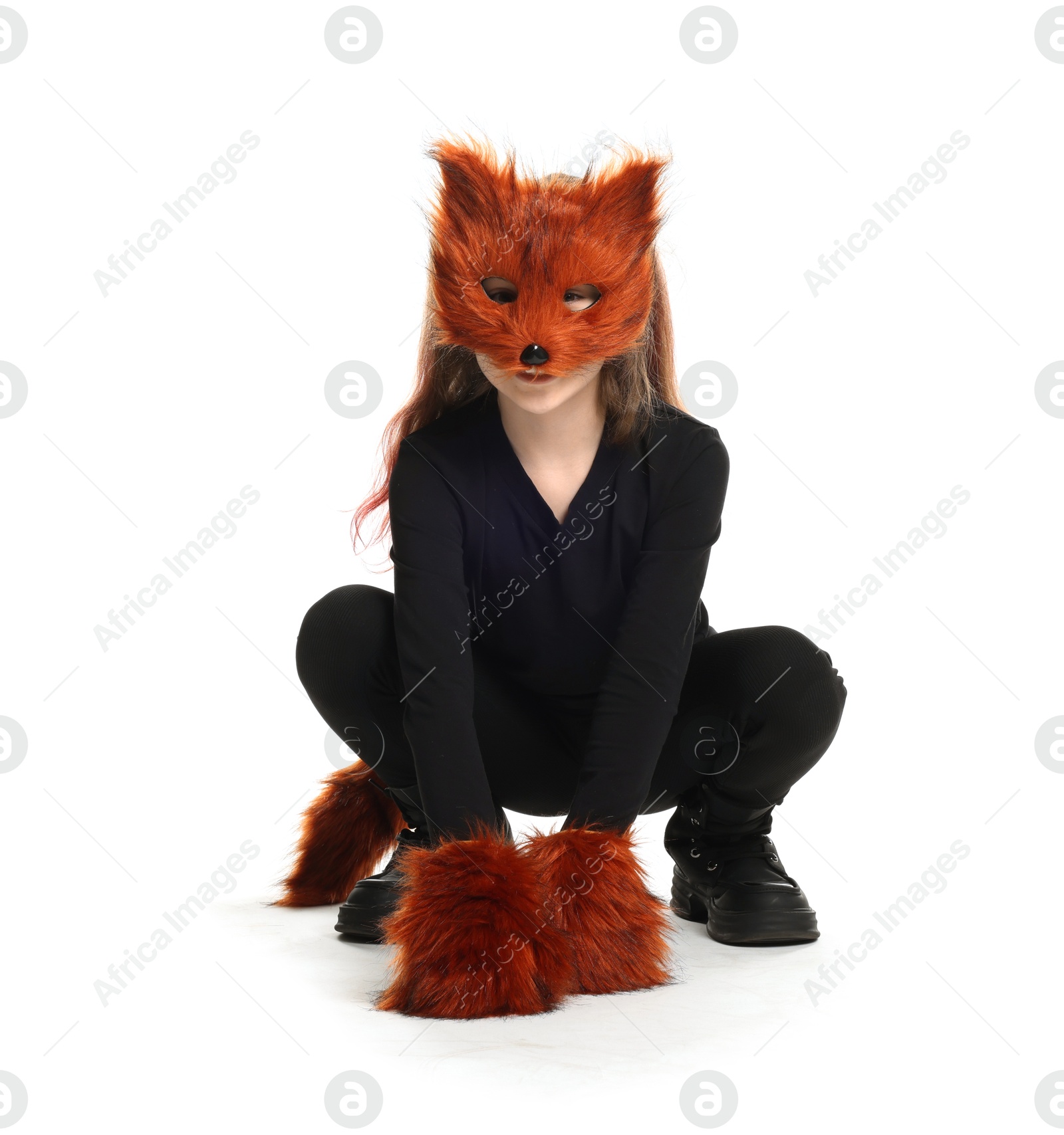 Photo of Quadrobics. Girl wearing fox mask, tail and gloves on white background