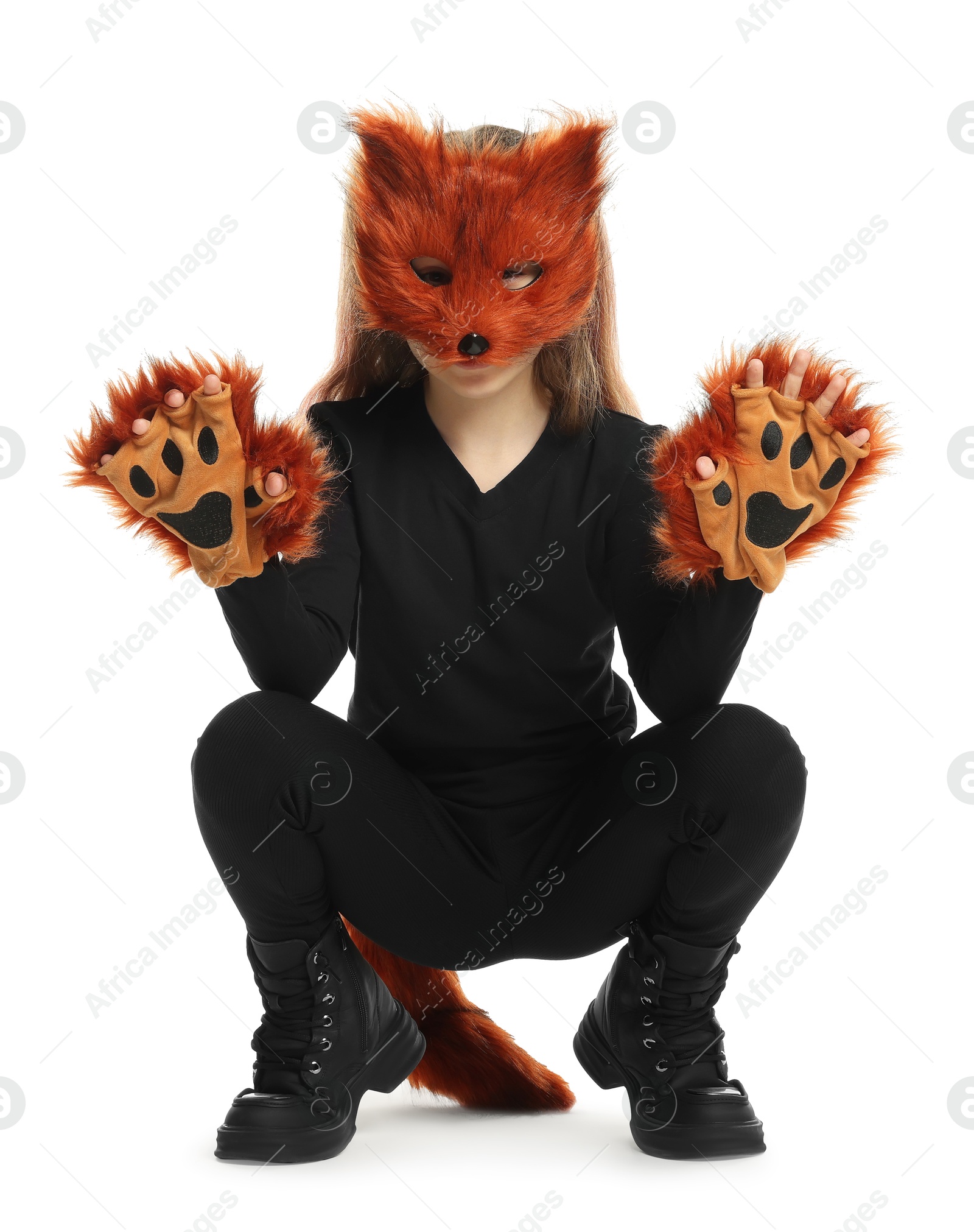 Photo of Quadrobics. Girl wearing fox mask, tail and gloves on white background