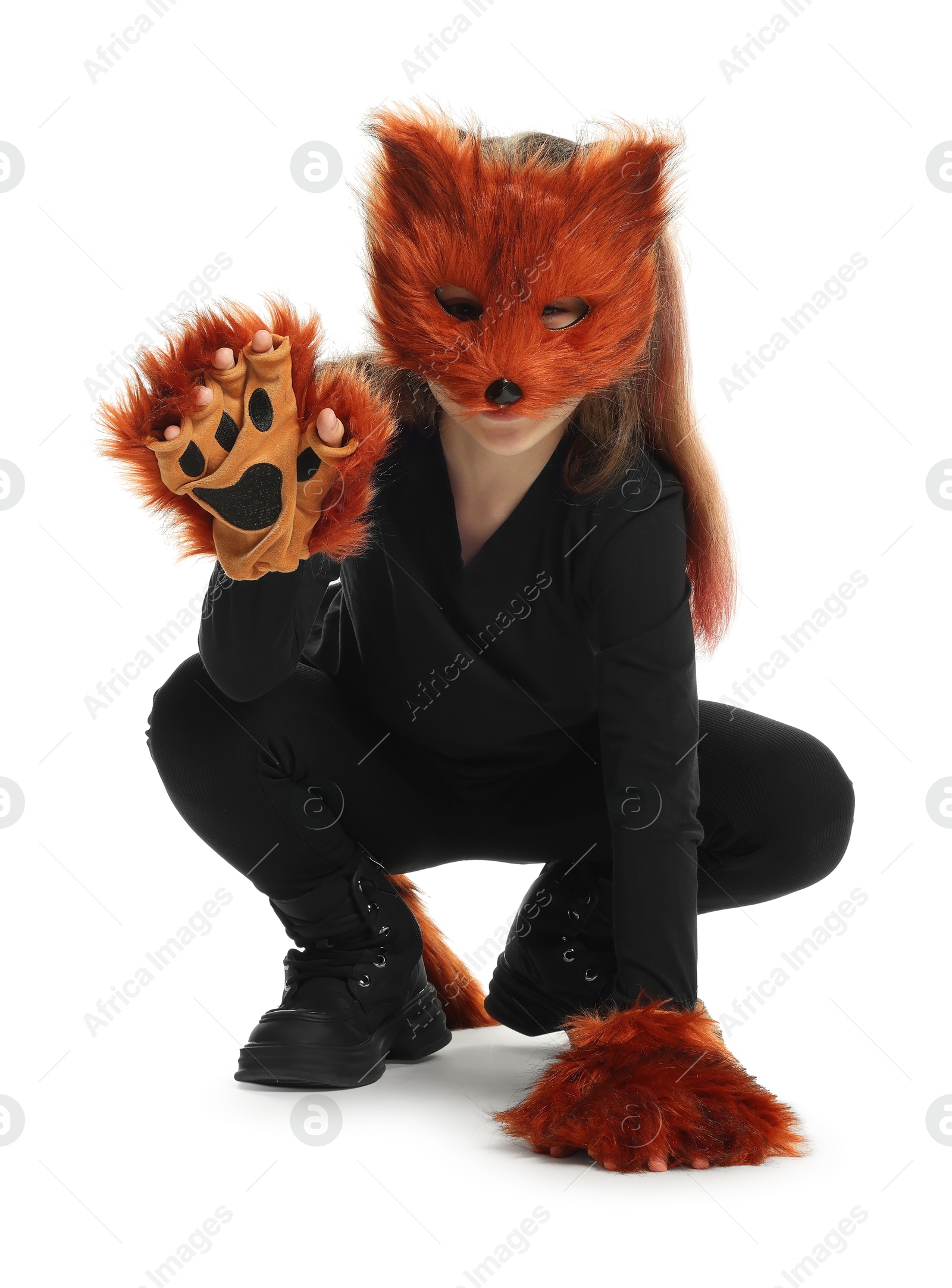 Photo of Quadrobics. Girl wearing fox mask, tail and gloves on white background