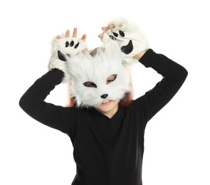 Photo of Quadrobics. Girl wearing cat mask and gloves on white background