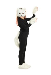 Photo of Quadrobics. Girl wearing cat mask, tail and gloves on white background